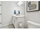 Bathroom featuring a white vanity with a large mirror and simple, elegant decor at 5437 Del Coronado Dr, Apollo Beach, FL 33572