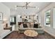 Open concept living space featuring a modern kitchen and stylish furniture at 5437 Del Coronado Dr, Apollo Beach, FL 33572