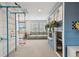 Bright playroom with a charming playhouse, gymnastic ladder, and cozy seating area at 5437 Del Coronado Dr, Apollo Beach, FL 33572