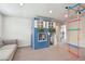 Fun playroom area featuring a creative playhouse and gymnastic ladder for active children at 5437 Del Coronado Dr, Apollo Beach, FL 33572