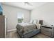 Cozy bedroom featuring neutral walls, a comfortable bed, and a natural light from the window at 5477 Wayfarer Ave, Apollo Beach, FL 33572