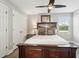 Comfortable bedroom with wood-look floors, a ceiling fan, and a large, sturdy bed at 5477 Wayfarer Ave, Apollo Beach, FL 33572