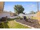 Spacious backyard with a shed, screened in porch, and a cozy seating area at 5932 Mckee Lake N Dr, St Petersburg, FL 33709