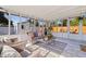 Screened lanai featuring a variety of seating options at 5932 Mckee Lake N Dr, St Petersburg, FL 33709