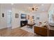 Open living room featuring a ceiling fan, modern furniture, and great natural light at 5932 Mckee Lake N Dr, St Petersburg, FL 33709