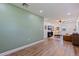 Spacious living room featuring laminate floors and an open layout at 5932 Mckee Lake N Dr, St Petersburg, FL 33709
