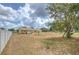 Vast backyard offering plenty of space for outdoor activities, with a well-maintained lawn and a secure fence at 5939 14Th St, Zephyrhills, FL 33542
