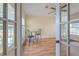 Sun room with hardwood floors, windows, and a ceiling fan at 5939 14Th St, Zephyrhills, FL 33542