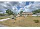 Lovely one-story home featuring a well-manicured yard and a welcoming entryway at 5939 14Th St, Zephyrhills, FL 33542