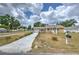 Inviting single-Gathering house with a long driveway and charming curb appeal at 5939 14Th St, Zephyrhills, FL 33542