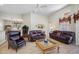 Bright living room boasts high ceilings, and a view to the dining area and outdoor pool at 6104 Cognac Cir, Lutz, FL 33558