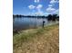 Scenic pond view with clear water and lush surroundings, offering a tranquil natural setting at 710 N Village N Dr # 102, St Petersburg, FL 33716