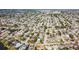 Expansive aerial view showcasing the density of homes, green spaces, and the overall community layout at 7534 Culberson Dr, Port Richey, FL 34668