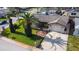 Lovely single-Gathering home featuring a well-manicured lawn, lush landscaping, and desirable curb appeal at 7534 Culberson Dr, Port Richey, FL 34668
