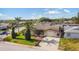 Beautiful single-Gathering home with a well-manicured lawn, lush landscaping, and a lovely curbside appeal at 7534 Culberson Dr, Port Richey, FL 34668