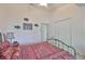 Bright bedroom with large closet, featuring decor, dresser and Octopus painting at 7649 Nottinghill Sky Dr, Apollo Beach, FL 33572