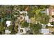 Overhead aerial view of the property highlighting its mature trees and well-maintained surroundings at 8239 26Th N Ave, St Petersburg, FL 33710