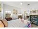Bright bedroom with a desk next to a window at 8239 26Th N Ave, St Petersburg, FL 33710