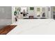 Kitchen island with bar seating that looks into the living room and dining room at 8239 26Th N Ave, St Petersburg, FL 33710