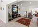 Open living space with a decorative rug, fireplace, and access to dining area at 8239 26Th N Ave, St Petersburg, FL 33710
