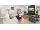 Comfortable living area featuring a large window and access to outdoor dining at 8239 26Th N Ave, St Petersburg, FL 33710