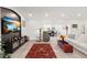 Expansive living room with neutral tones, an area rug, and an open layout at 8239 26Th N Ave, St Petersburg, FL 33710
