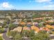 An aerial view of a beautiful neighborhood with community lakes and lush landscaping at 980 Live Oak Ne Ave, St Petersburg, FL 33703