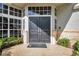 Stylish double front door with sidelights and transom window for a grand entrance at 980 Live Oak Ne Ave, St Petersburg, FL 33703