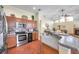 Functional kitchen with stainless steel appliances and seamless views into the living room at 980 Live Oak Ne Ave, St Petersburg, FL 33703
