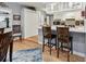 Charming kitchen featuring an eat-in breakfast bar with modern countertops and bright cabinetry at 1703 Ryan Dr, Lutz, FL 33549