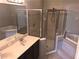 Bathroom showcasing double sinks, glass shower, and a soaking tub for a serene experience at 10402 Tulip Field Way, Riverview, FL 33578