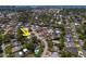 Areal View of property showing the location, neighboring homes, and the surrounding community at 10515 Hetrick W Cir, Largo, FL 33774