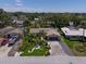 Areal View of property showing the location, neighboring homes, boat storage, and tropical landscaping at 10515 Hetrick W Cir, Largo, FL 33774