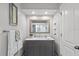 Updated bathroom with a modern vanity offers ample storage and a clean, contemporary design at 10515 Hetrick W Cir, Largo, FL 33774