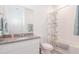 Bathroom features a single sink vanity with a gray countertop and shower tub at 11830 Brighton Knoll Loop, Riverview, FL 33579