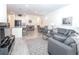 Open floor plan with living room and dining area offers seamless entertaining at 11830 Brighton Knoll Loop, Riverview, FL 33579