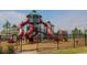 Community playground with slides and climbing structures at 11830 Brighton Knoll Loop, Riverview, FL 33579
