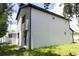 Exterior of a modern home with a well-manicured lawn at 12484 Cross St, Largo, FL 33773