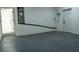 Finished basement with painted floor and utility access with walk out to back yard at 12484 Cross St, Largo, FL 33773