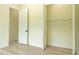 Bright bedroom with large closet space, neutral walls, and light flooring providing ample room and style at 12484 Cross St, Largo, FL 33773