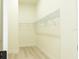Spacious walk-in closet with wire shelving for organized storage solutions at 12484 Cross St, Largo, FL 33773