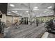Well-equipped fitness center with weight machines, cardio equipment, and ample space for exercise at 14313 Eagle Branch Dr, Nokomis, FL 34275