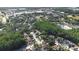 Community aerial showing lush landscaping, and the community's convenient location near commercial and recreational areas at 16107 Dawnview Dr, Tampa, FL 33624