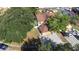 Aerial view of the home showing its well-manicured lawn, two car garage and proximity to street parking at 16107 Dawnview Dr, Tampa, FL 33624