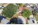 Aerial view of a home with a well-manicured lawn, a driveway and ample parking on the street at 16107 Dawnview Dr, Tampa, FL 33624