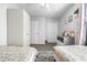 Comfortable bedroom with two beds, closet, and a dresser at 16107 Dawnview Dr, Tampa, FL 33624