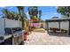 Backyard with pavers, a covered gazebo, a barbecue grill, and a spa with a privacy screen at 1710 Shore Acres Ne Blvd, St Petersburg, FL 33703