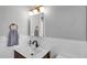 Modern bathroom with stylish vanity, fixtures, and tile backsplash at 1710 Shore Acres Ne Blvd, St Petersburg, FL 33703