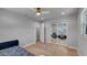 Bedroom features hardwood flooring, neutral walls and built in closet at 1710 Shore Acres Ne Blvd, St Petersburg, FL 33703