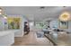Open-concept living space with modern furnishings, natural light, and flowing layout at 1710 Shore Acres Ne Blvd, St Petersburg, FL 33703